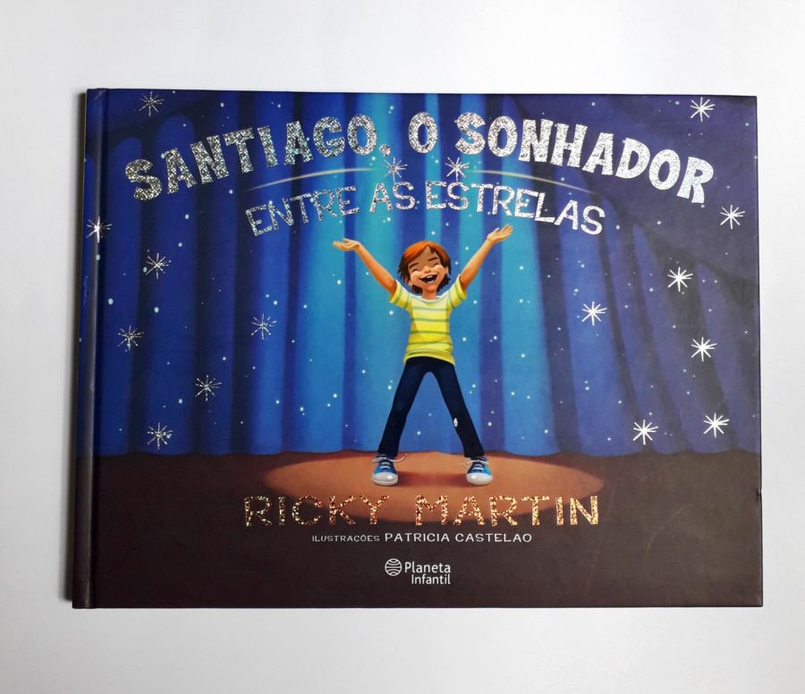<a href="https://www.touchelivros.com.br/livro/santiago-o-sonhador-entre-as-estrelas/">Santiago o Sonhador Entre as Estrelas - Ricky Martin</a>
