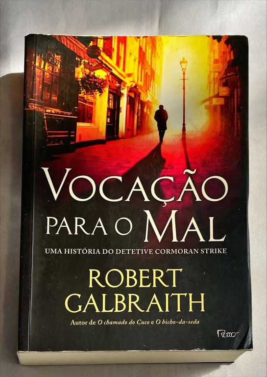 <a href="https://www.touchelivros.com.br/livro/vocacao-para-o-mal/">Vocação Para o Mal - Robert Galbraith</a>