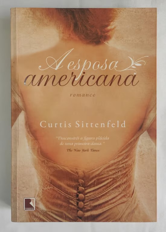 <a href="https://www.touchelivros.com.br/livro/a-esposa-americana/">A Esposa Americana - Curtis Sittenfeld</a>