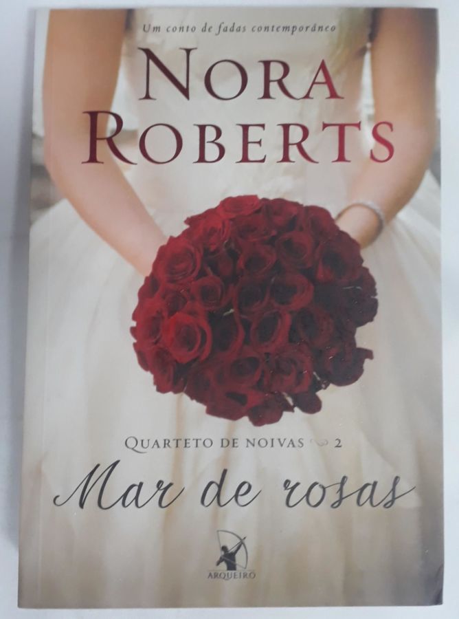 <a href="https://www.touchelivros.com.br/livro/mar-de-rosas-quarteto-de-noivas-livro-2-2/">Mar de rosas (Quarteto de noivas – Livro 2) - Nora Roberts</a>