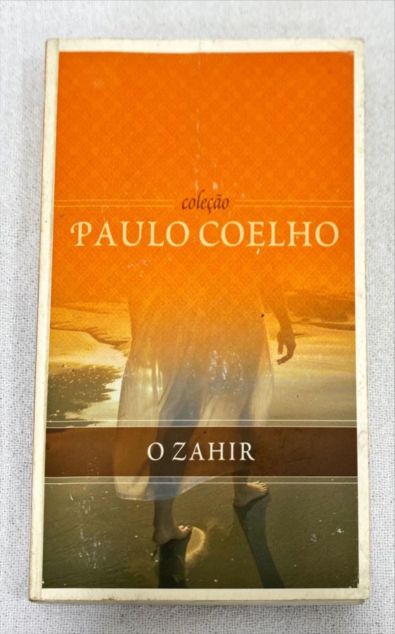 <a href="https://www.touchelivros.com.br/livro/o-zahir-7/">O Zahir - Paulo Coelho</a>