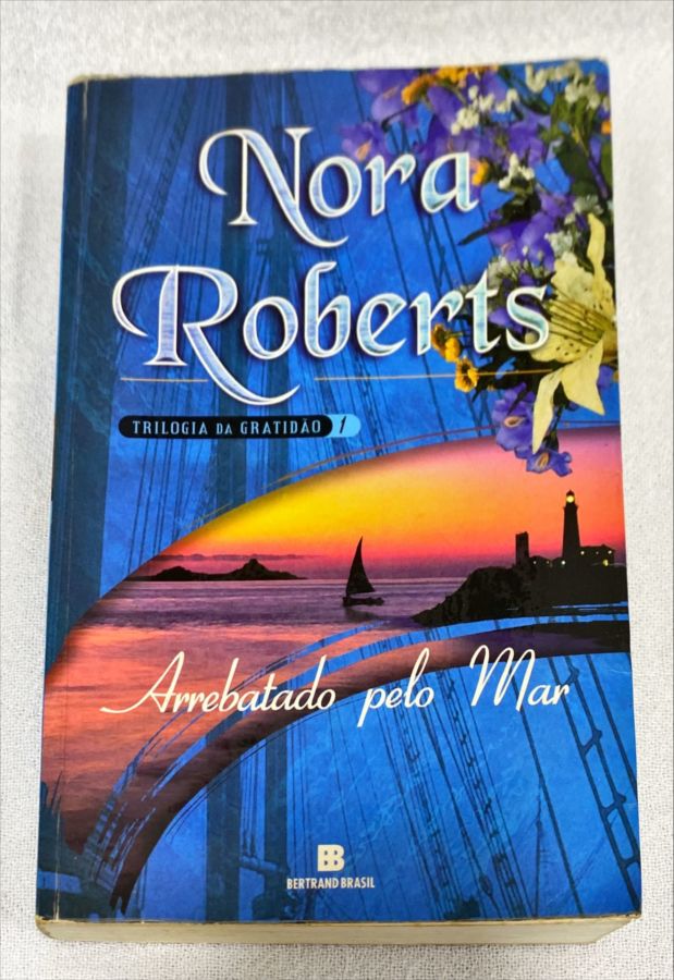 <a href="https://www.touchelivros.com.br/livro/arrebatado-pelo-mar-2/">Arrebatado Pelo Mar - Nora Roberts</a>