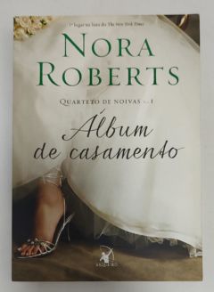 <a href="https://www.touchelivros.com.br/livro/album-de-casamento-quarteto-de-noivas-vol-1/">Álbum De Casamento – Quarteto De Noivas Vol. 1 - Nora Roberts</a>
