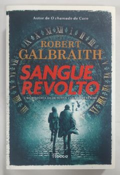 <a href="https://www.touchelivros.com.br/livro/sangue-revolto/">Sangue Revolto - Robert Galbraith (pseudonimo de J. K. Rowling)</a>
