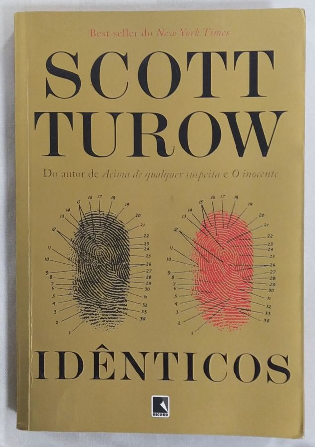 <a href="https://www.touchelivros.com.br/livro/identicos/">Idênticos - Scott Turow</a>